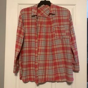 Pink plaid button up shirt.